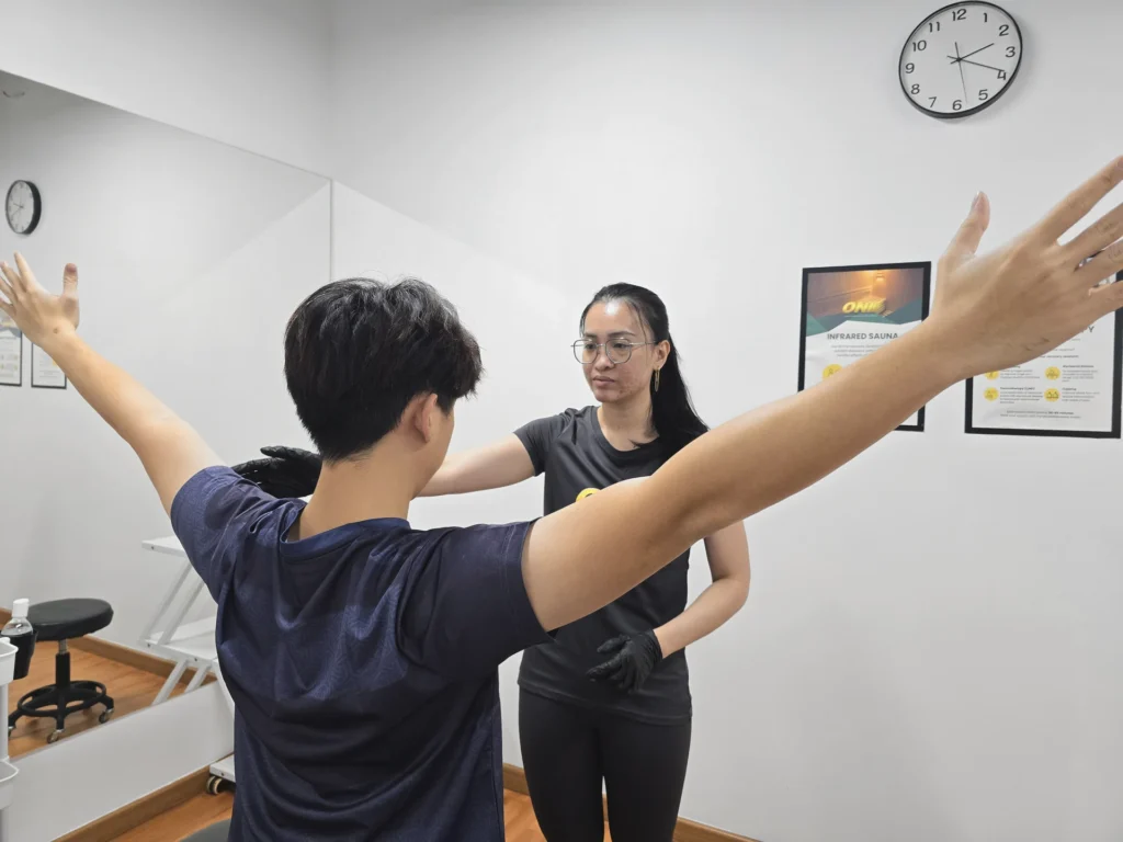 physiotherapist-shoulder-movement-check
