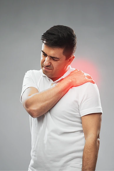 man-holding-shoulder-red-glow-graphic