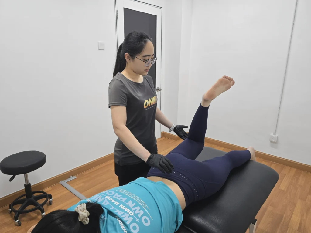physiotherapist assess lower back pain