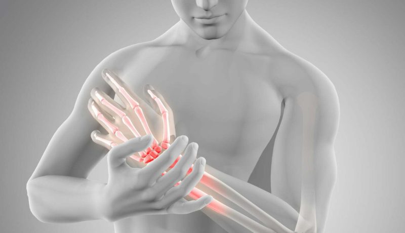 3d-male-medical-figure-holding-wrist-pain-with-glowing-bones